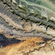 Satellite view of Ouarkziz crater, located in northwestern Algeria near the Morocco border. This image shows a closer view of the 3.5-km asteroid impact dated to be less than 70 million years old.